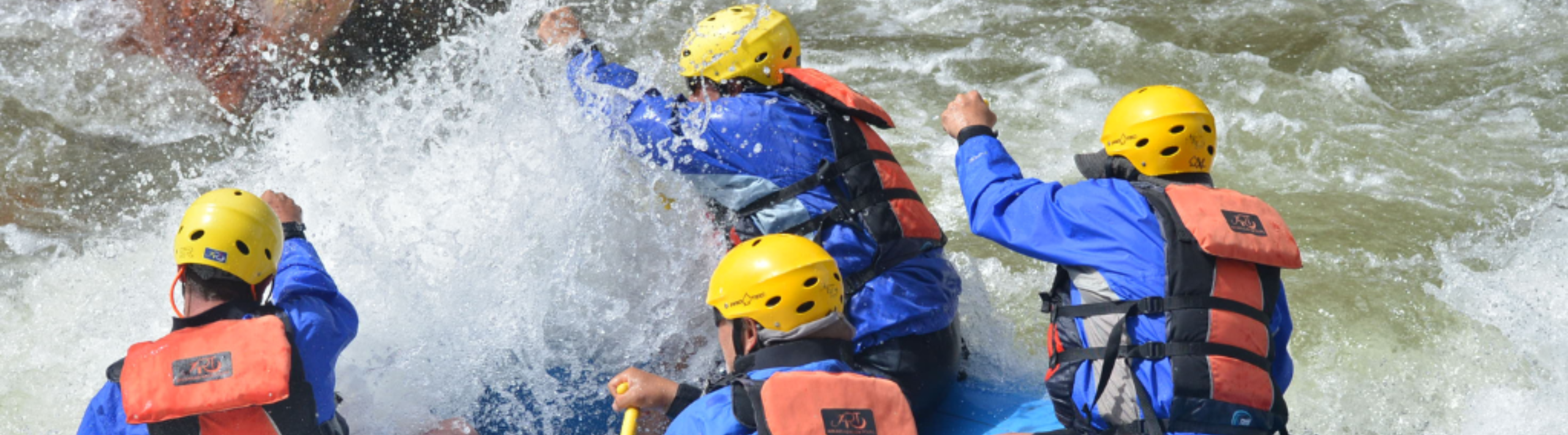 group on boat during early season rafting in colorado